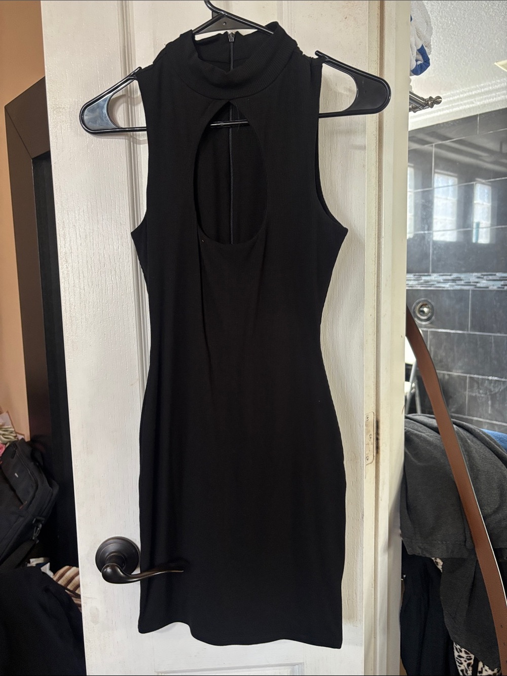 naked wardrobe Black Sleeveless Mini Dress with Front Keyhole